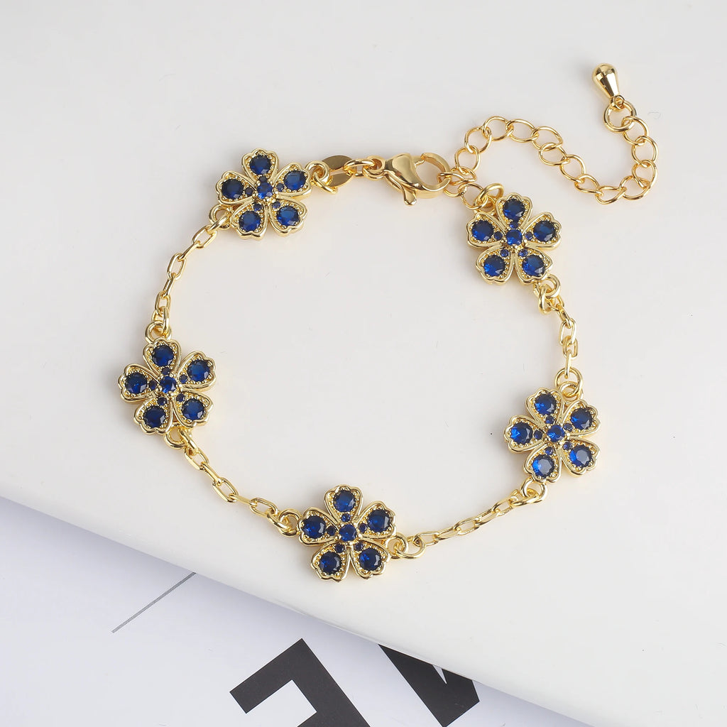Cristal Zircon cinq feuilles fleur étamine fleur de prunier ensemble Bracelet collier boucle d'oreille mignon femmes 18K plaqué or bijoux trèfle