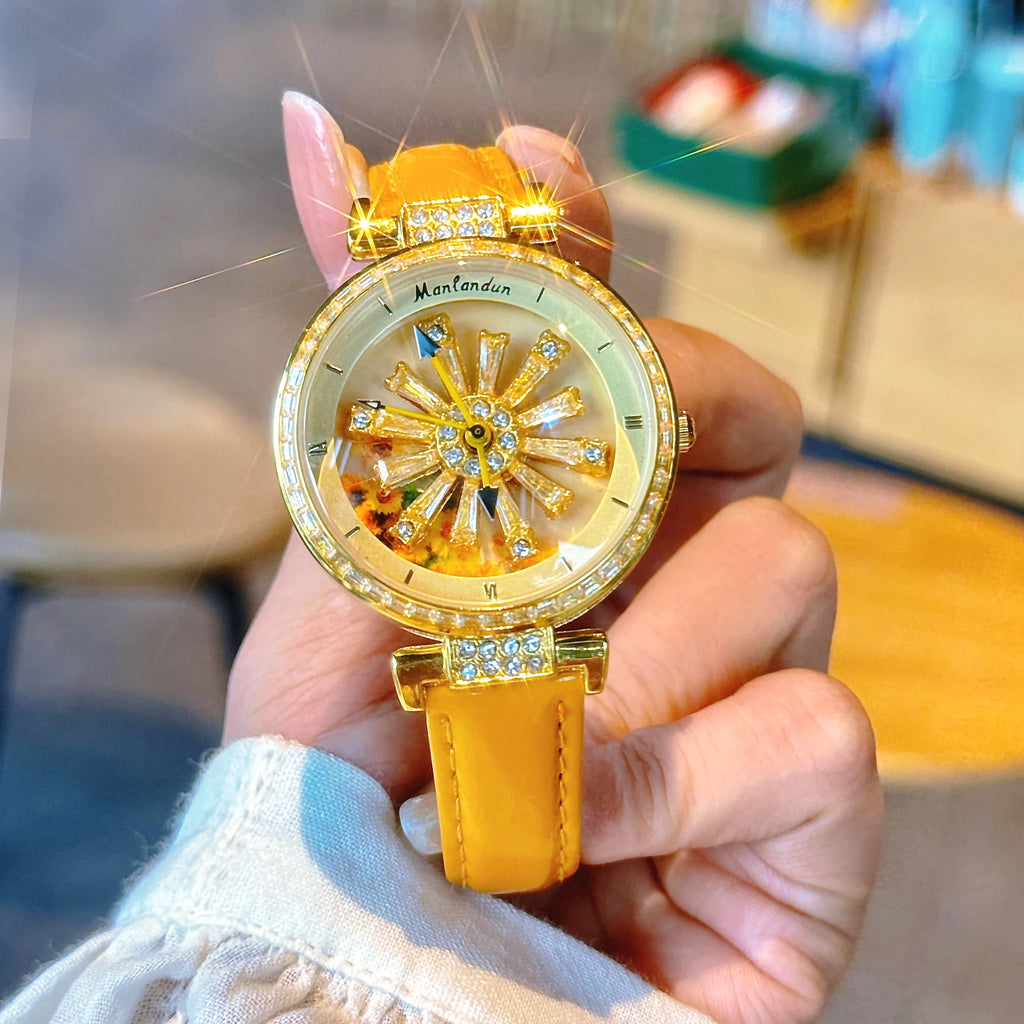 Montre élégante pour femmes, dos transparent, diamants incrustés, cadran galactique rotatif, Design Sunflower, boîtier en acier inoxydable, bracelet en cuir orange, montre à quartz étanche pour les rencontres des fem