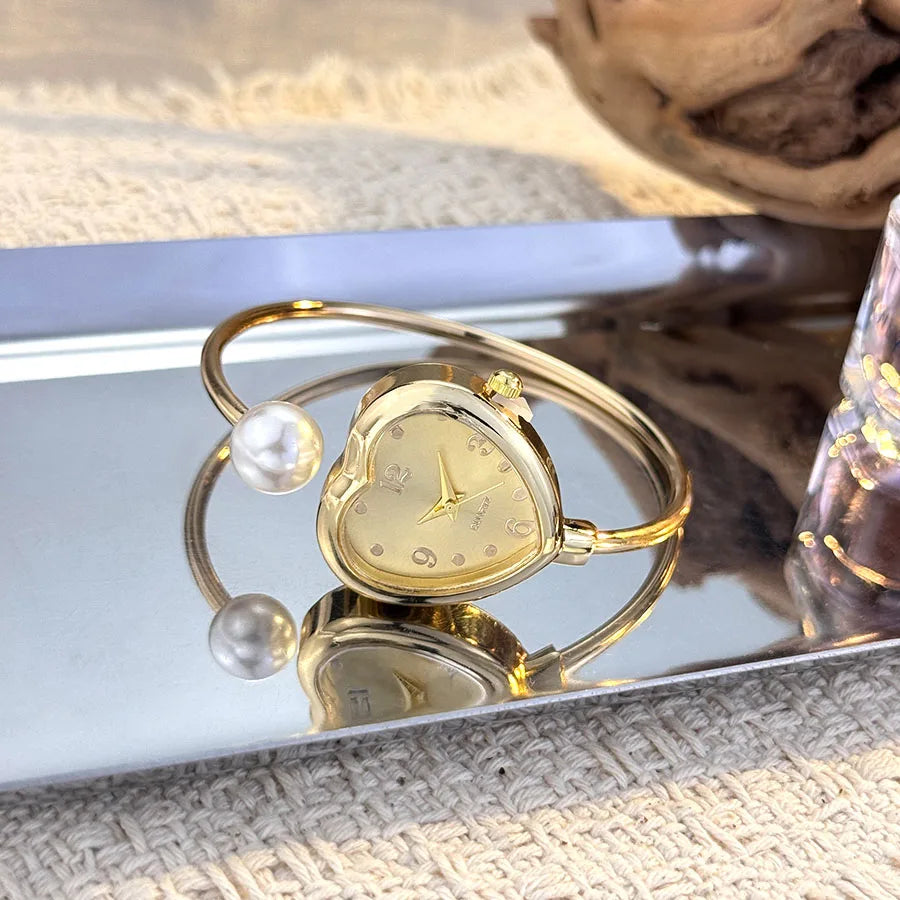 Montre Style Bracelet conception ouverte perle amour montre à Quartz, forme de coeur délicate, montre pour femme Portable nouveau style