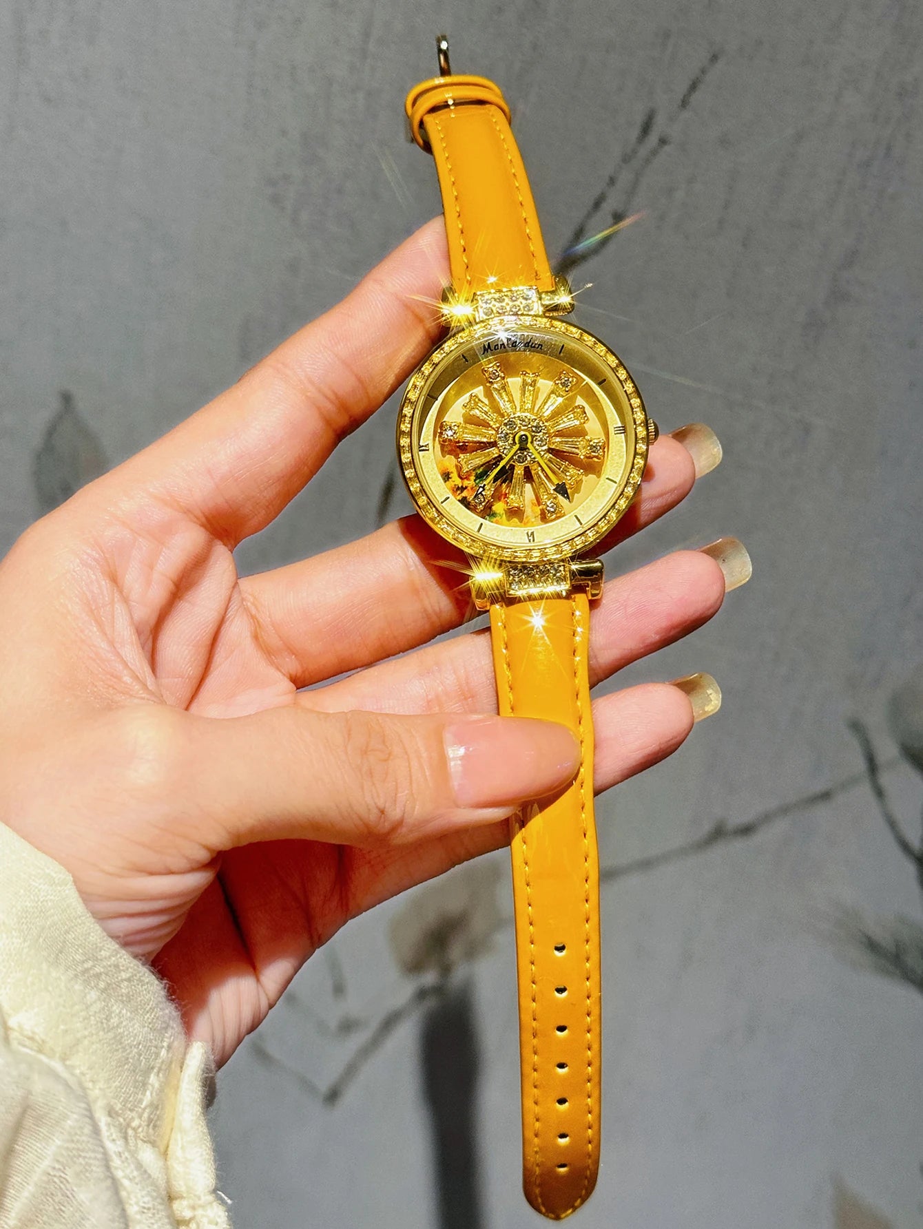 Montre élégante pour femmes, dos transparent, diamants incrustés, cadran galactique rotatif, Design Sunflower, boîtier en acier inoxydable, bracelet en cuir orange, montre à quartz étanche pour les rencontres des fem