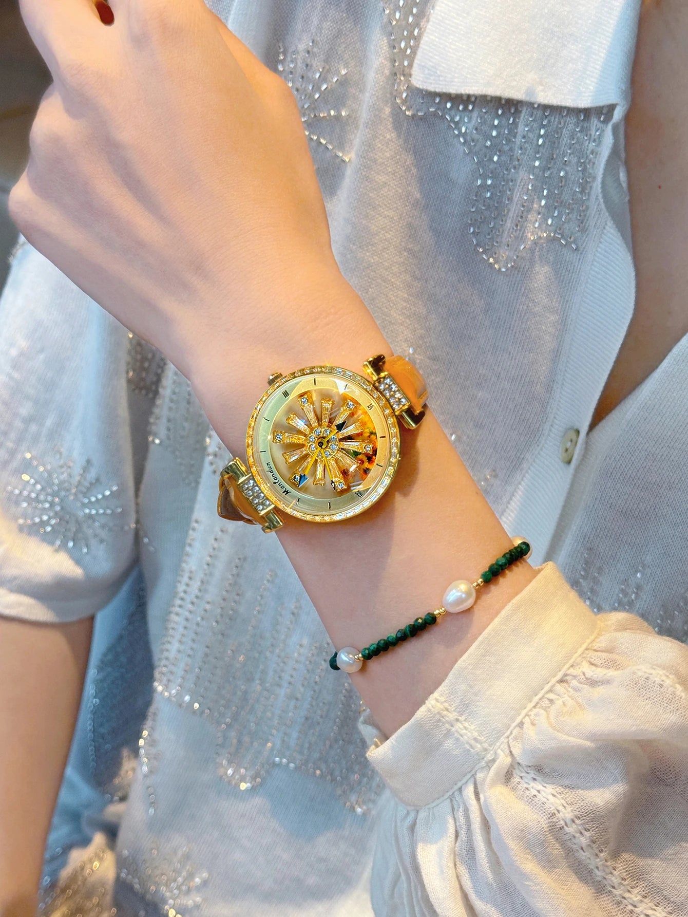 Montre élégante pour femmes, dos transparent, diamants incrustés, cadran galactique rotatif, Design Sunflower, boîtier en acier inoxydable, bracelet en cuir orange, montre à quartz étanche pour les rencontres des fem