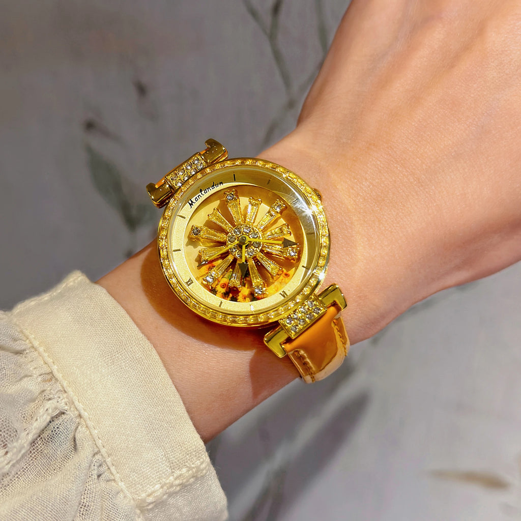 Montre élégante pour femmes, dos transparent, diamants incrustés, cadran galactique rotatif, Design Sunflower, boîtier en acier inoxydable, bracelet en cuir orange, montre à quartz étanche pour les rencontres des fem