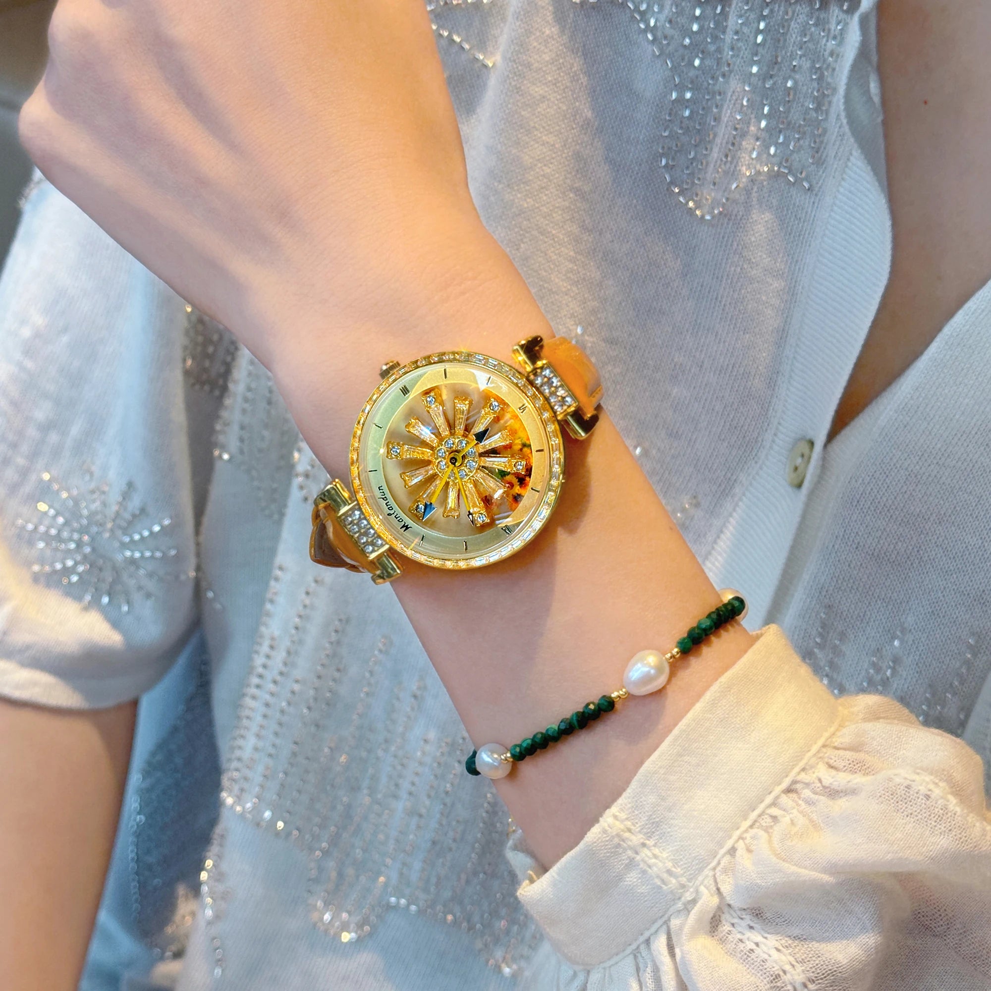Montre élégante pour femmes, dos transparent, diamants incrustés, cadran galactique rotatif, Design Sunflower, boîtier en acier inoxydable, bracelet en cuir orange, montre à quartz étanche pour les rencontres des fem
