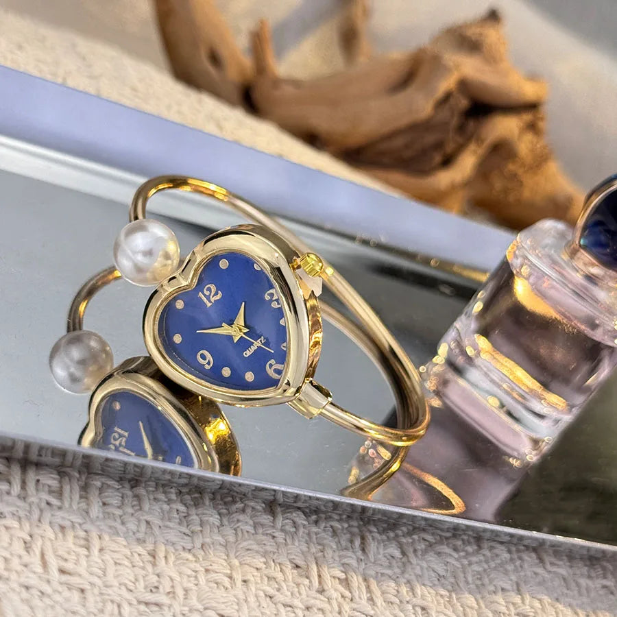 Montre Style Bracelet conception ouverte perle amour montre à Quartz, forme de coeur délicate, montre pour femme Portable nouveau style